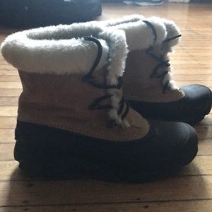 Sorel black and beige short winter boots.
